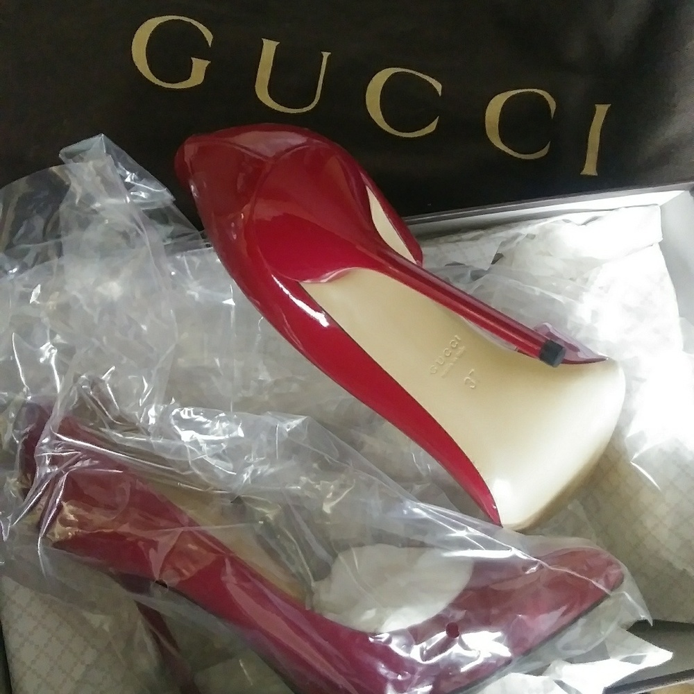 Red Gucci stilettos